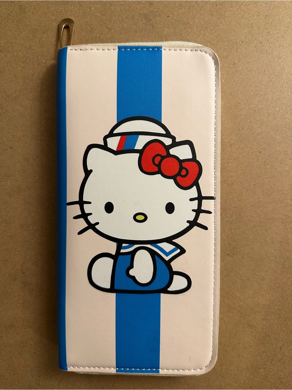 Character Blue and White Stripe Zip Wallet.
NWOT
Buy 1 get 1 for 50% off